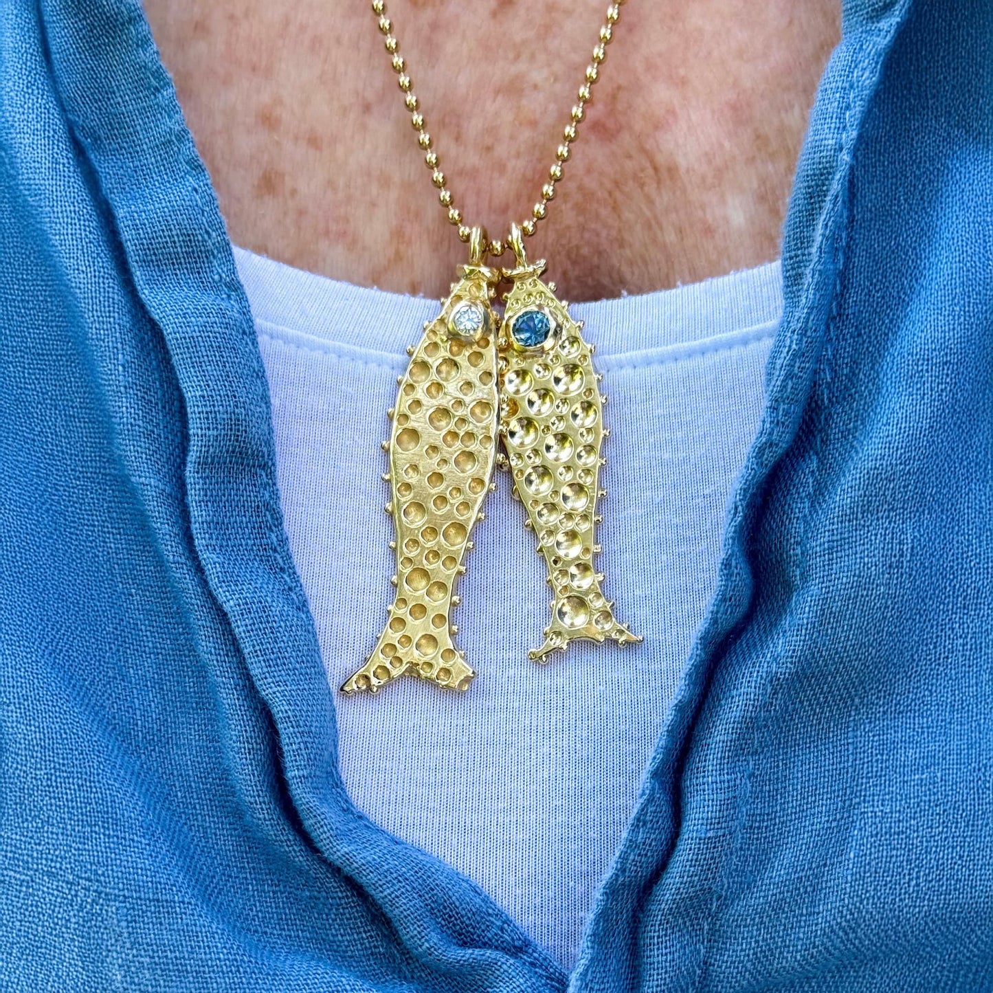 18 Karat Gold Fish set with Sapphire Eyes Pendant